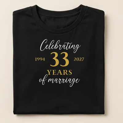 33 Years of Marriage shirt featuring elegant lettering in gold and white — printed on a women's shirt