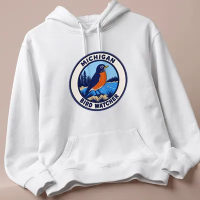 Vintage patch graphic of an American Robin with Michigan Bird Watcher text — printed on a unisex hoodie