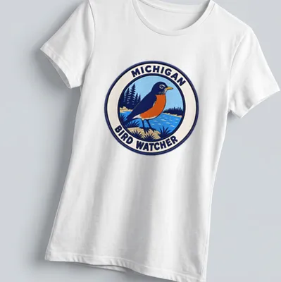 Vintage patch graphic of an American Robin with Michigan Bird Watcher text — printed on a women's shirt
