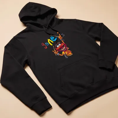 Cartoon style T-shirt featuring Animal Drummer from The Muppets in vibrant colors. — printed on a unisex hoodie