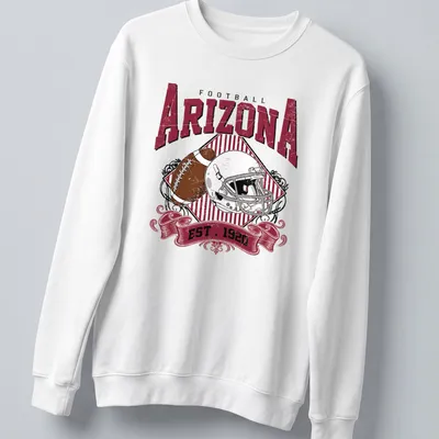 Vintage retro Arizona Football t-shirt with a helmet and football illustration — printed on a unisex sweatshirt