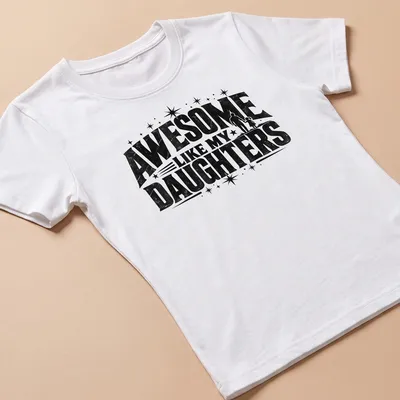 Vintage distressed tee with 'Awesome Like My Daughters' text and father-daughter illustration — printed on a women's shirt