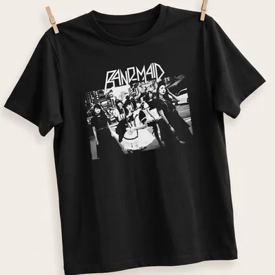 Monochrome silhouette t-shirt featuring the text Band Maid in an urban scene.