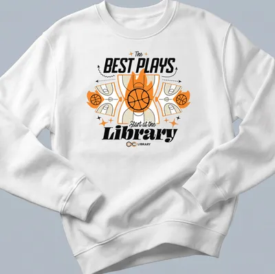 Bold graphic tee with basketball theme and motivational text about the library — printed on a unisex sweatshirt