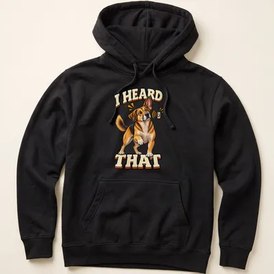 Cartoon Beagle dog with alert expression and text 'I HEARD THAT' — printed on a unisex hoodie