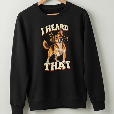Cartoon Beagle dog with alert expression and text 'I HEARD THAT' — printed on a unisex sweatshirt