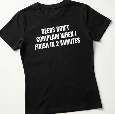 Bold typography shirt featuring humorous beer phrase in white text. — printed on a women's shirt