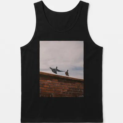 Photographic design of birds perched on a brick wall in natural colors — printed on a tank top