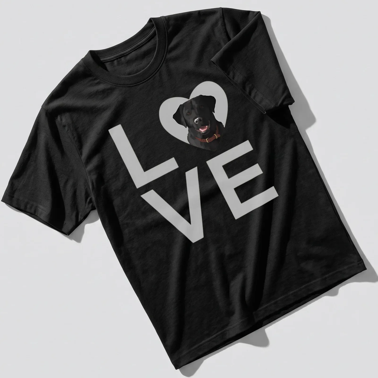 Realistic print of a black Labrador retriever with the word LOVE — printed on a unisex t-shirt