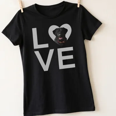 Realistic print of a black Labrador retriever with the word LOVE — printed on a women's shirt