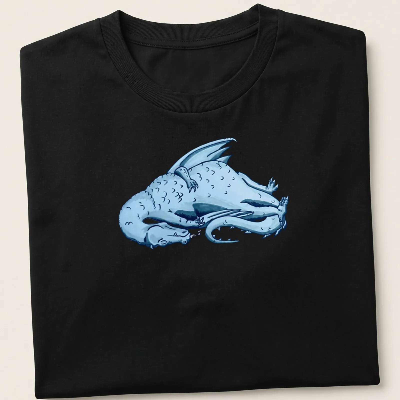 Illustrative print of a blue sleeping dragon among clouds — printed on a unisex t-shirt