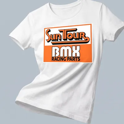 Vintage retro BMX Racing Parts t-shirt with orange and black text and graphics — printed on a women's shirt