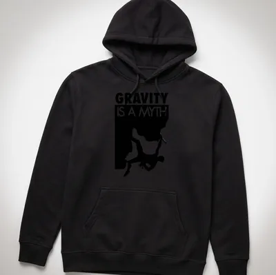 Minimalist design featuring a bouldering climber and the text 'Gravity Is A Myth' — printed on a unisex hoodie