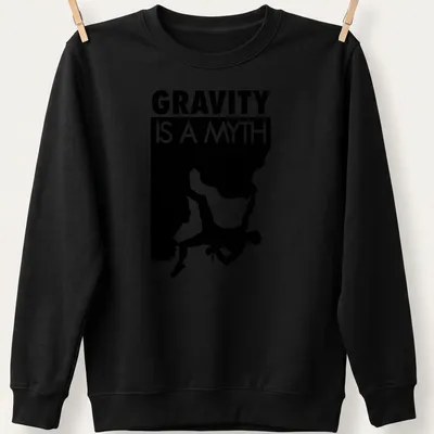 Minimalist design featuring a bouldering climber and the text 'Gravity Is A Myth' — printed on a unisex sweatshirt