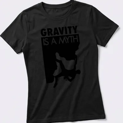 Minimalist design featuring a bouldering climber and the text 'Gravity Is A Myth' — printed on a women's shirt