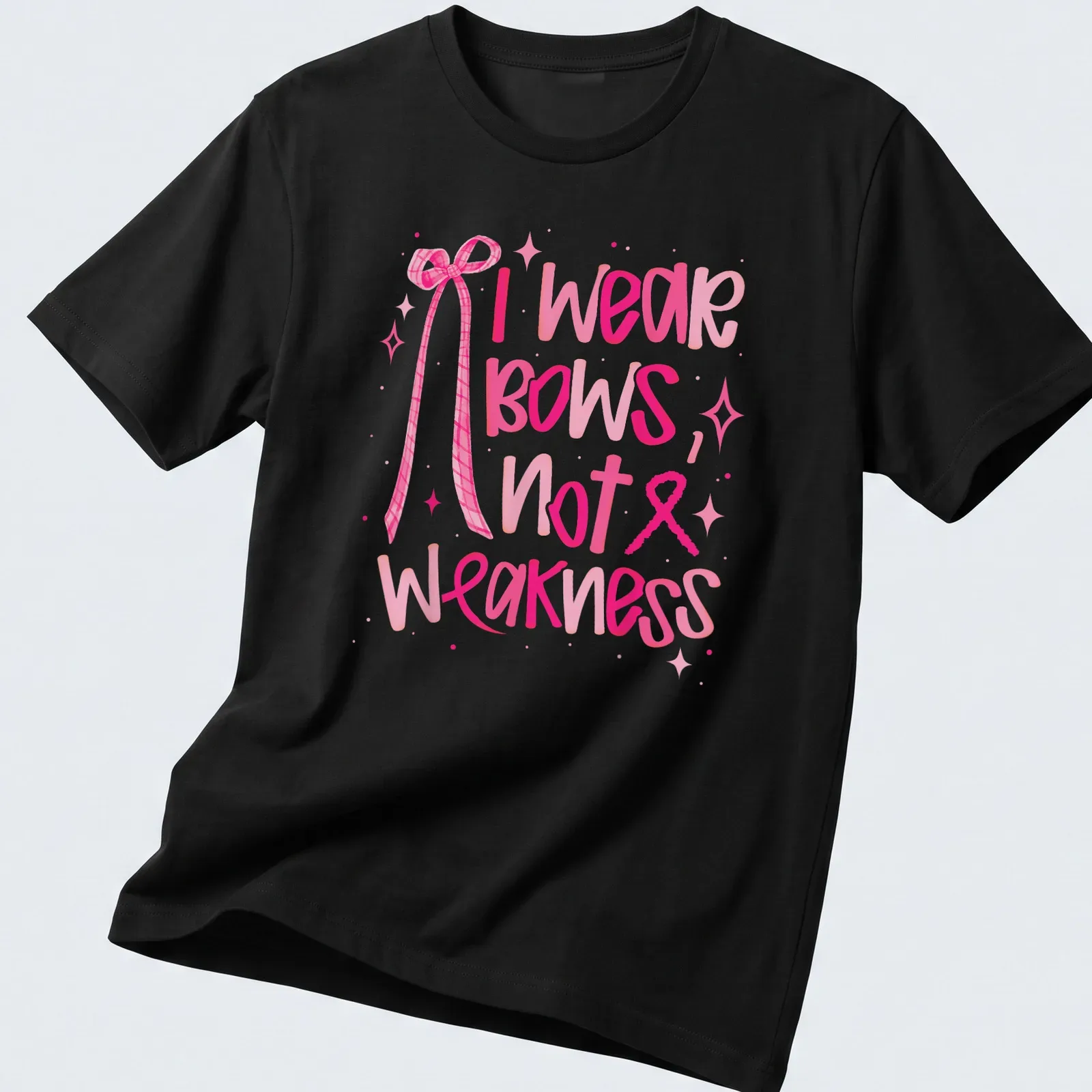 Playful watercolor T-shirt featuring a bow and the phrase 'I wear bows, not weakness' — printed on a unisex t-shirt