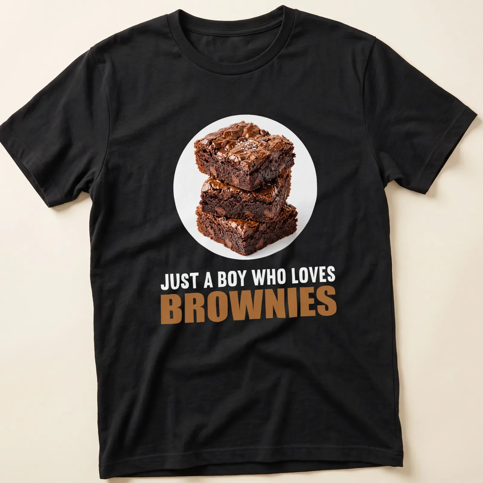 Illustration of a stack of brownies with text saying 'Just A Boy Who Loves Brownies' — printed on a unisex t-shirt