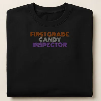 Halloween-themed shirt with a playful Candy Inspector character and colorful stripes — printed on a unisex sweatshirt