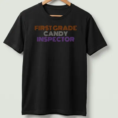Halloween-themed shirt with a playful Candy Inspector character and colorful stripes