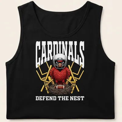 Bold cartoon cardinal in a football helmet with text 'CARDINALS DEFEND THE NEST' — printed on a tank top