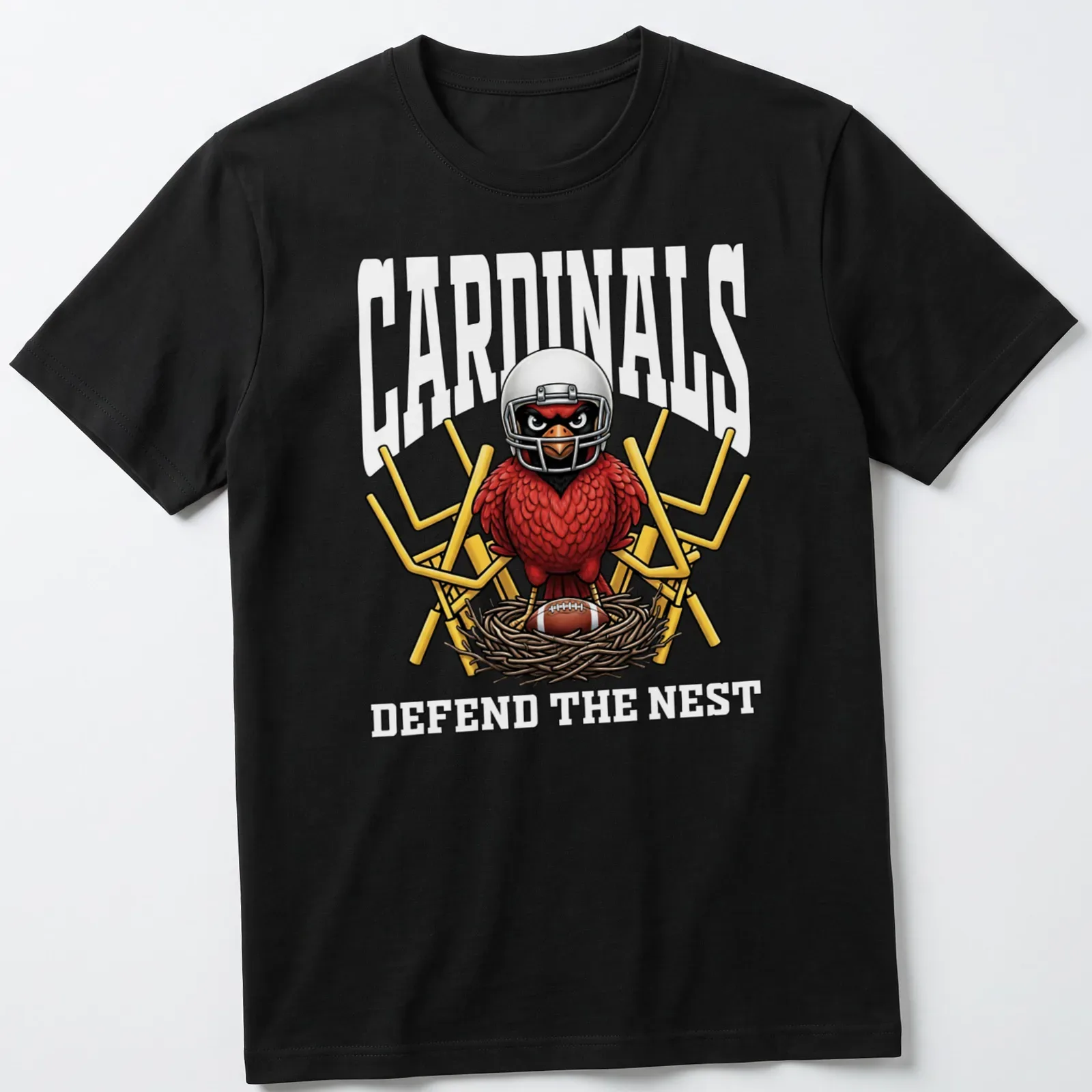 Bold cartoon cardinal in a football helmet with text 'CARDINALS DEFEND THE NEST' — printed on a unisex t-shirt