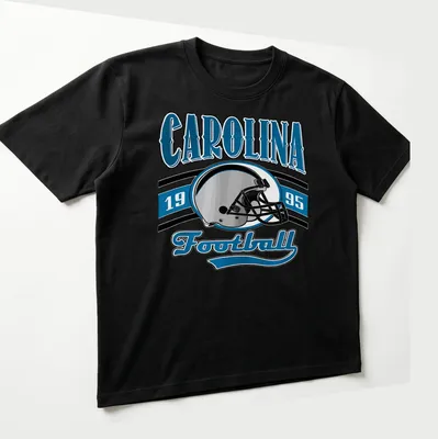Retro Carolina Football T-shirt featuring a helmet and bold lettering. — printed on a unisex t-shirt (angled view)