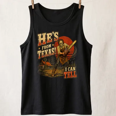 Vintage horror print featuring a chainsaw-wielding figure and bold text — printed on a tank top