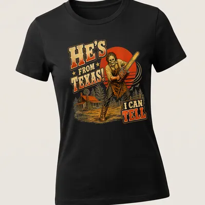 Vintage horror print featuring a chainsaw-wielding figure and bold text — printed on a women's shirt