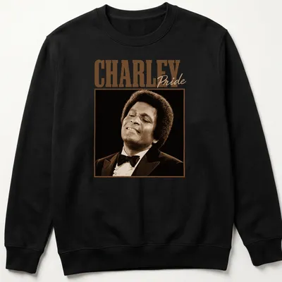 Vintage Charley Pride t-shirt featuring bold typography in brown and beige — printed on a unisex sweatshirt