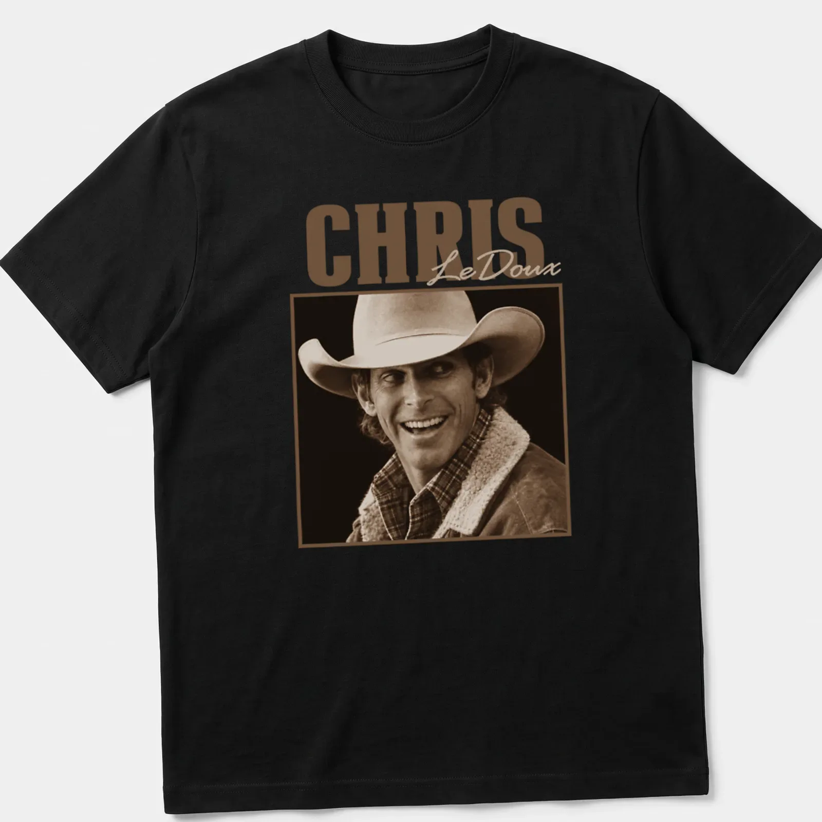 Vintage sepia Chris LeDoux T-shirt featuring a cowboy illustration in brown and cream. — printed on a unisex t-shirt