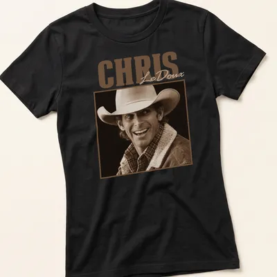 Vintage sepia Chris LeDoux T-shirt featuring a cowboy illustration in brown and cream. — printed on a women's shirt