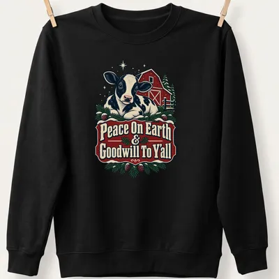 Vintage farmhouse style Christmas shirt featuring a cow and holiday message — printed on a unisex sweatshirt