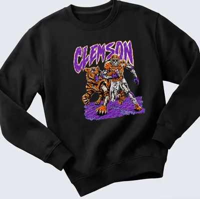 Retro shirt featuring a Clemson Tiger skeleton football player with vibrant colors. — printed on a unisex sweatshirt