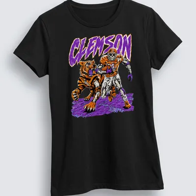 Retro shirt featuring a Clemson Tiger skeleton football player with vibrant colors. — printed on a women's shirt