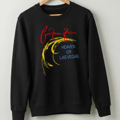 Bold colorful Cocteau Twins t-shirt with album title in red, yellow, and blue text — printed on a unisex sweatshirt
