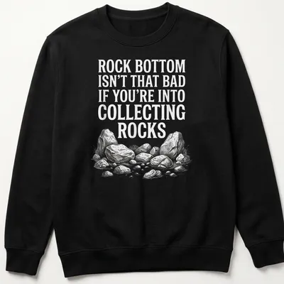 Sketch illustration of various rocks with humorous text about collecting rocks — printed on a unisex sweatshirt