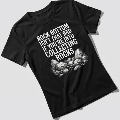 Sketch illustration of various rocks with humorous text about collecting rocks — printed on a women's shirt