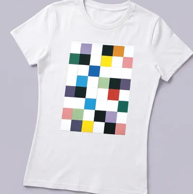 Colorful abstract square pattern on a minimalist t-shirt with modern typography — printed on a women's shirt