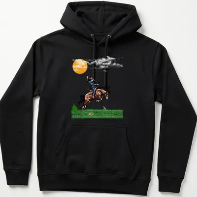 Vibrant illustration of a cowboy riding a horse at sunset with printed text 'Fight Or Flight' — printed on a unisex hoodie