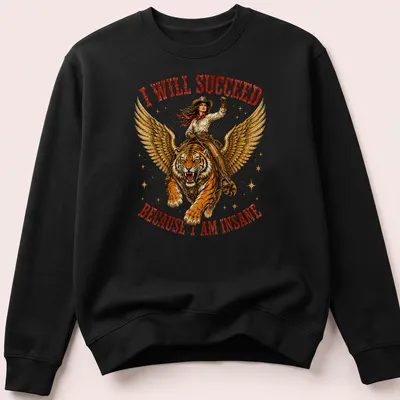 Illustration of a cowgirl riding a tiger with bold text about success above — printed on a unisex sweatshirt