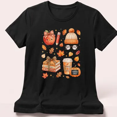 Kawaii watercolor design with books, pumpkin, coffee cup, and leaves — printed on a women's shirt