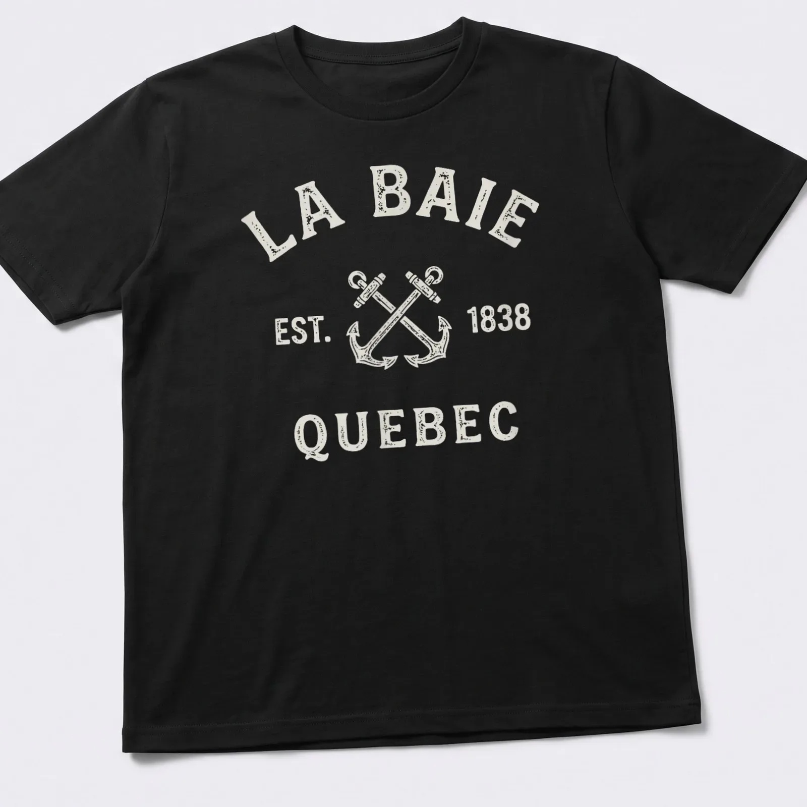 Vintage t-shirt featuring crossed boat anchors and La Baie, Quebec, established 1838 text. — printed on a unisex t-shirt