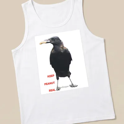 A photographic crow design with the text 'KEEP PEANUT REAL' in black and white. — printed on a tank top