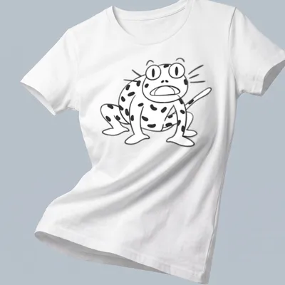 Kawaii cartoon frog character t-shirt in black and white line-art — printed on a women's shirt