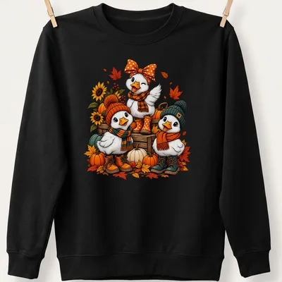 Colorful cartoon design of cute ducks in cozy sweaters for autumn. — printed on a unisex sweatshirt