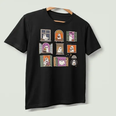 Kawaii style design of cute ghosts in windows with colorful accents — printed on a unisex t-shirt (angled view)
