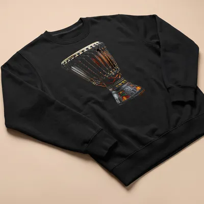 Realistic illustration of a djembes drum in brown, black, beige, red, green, and yellow — printed on a unisex sweatshirt