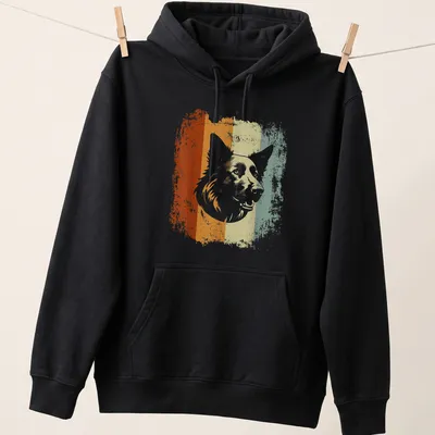 Retro distressed dog illustration in orange, cream, green, and brown — printed on a unisex hoodie