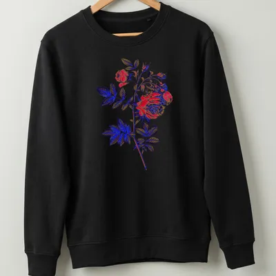 Dramatic rose illustration in red, blue, green, and black on — printed on a unisex sweatshirt