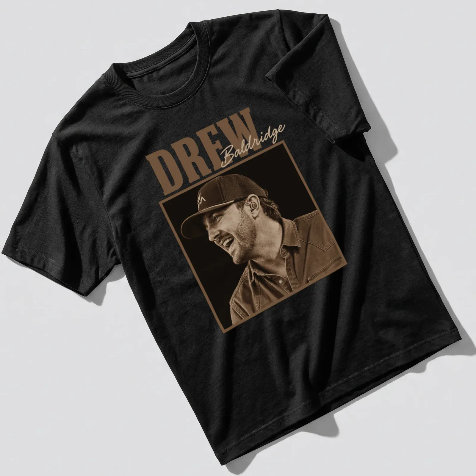Sepia-toned T-shirt featuring Drew Baldridge in vintage style. — printed on a unisex t-shirt